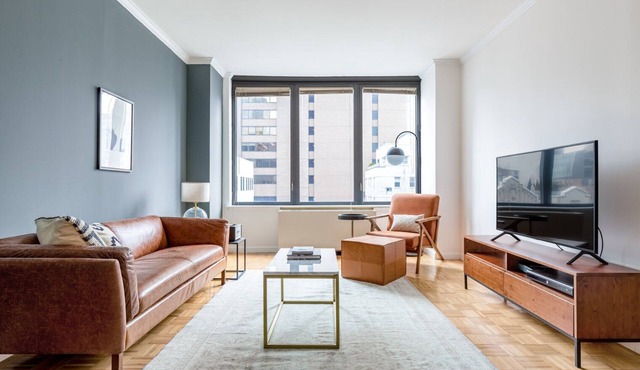 Smart Sutton Place 2BR w/Gym, Pool, near Central Park, by Blueground