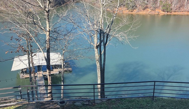 Smith Lake 5 bedroom modernized home with 2 slip boat dock.