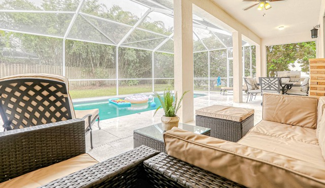 Snowbird-friendly home with private pool, screened lanai, game room, grill, AC