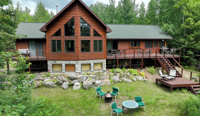 Snowmobile Retreat with Trailer Parking, Screen Porch, Sauna, 3 Bedrooms & Loft.