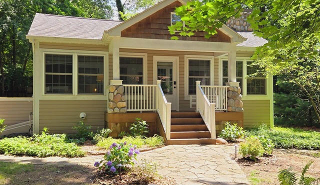 Snowy Escape: Cozy Michiana Cottage for 8 with Fireplace & Wooded Privacy