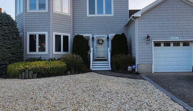 Snug Harbor waterfront property with pool. Minutes to Barnegat Bay and beach