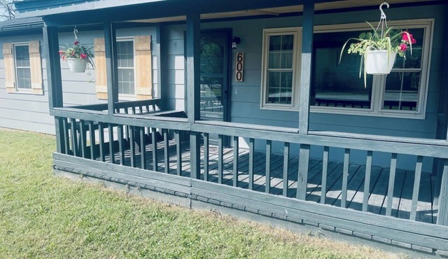 Snuggle up and relax with the whole family at this Ava home.