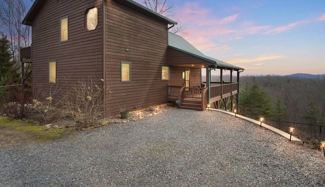 Solar powered, mountaintop chalet with hot tub - Pet Friendly! by RedAwning