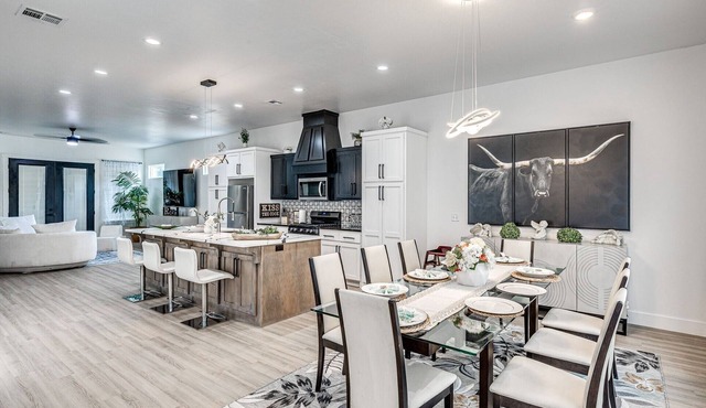 SOLENA VIP OKC: Pool, Jacuzzi, grill, pool table outside; cozy interior.