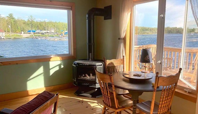 Sought-after 2-bedroom boathouse apartment right on the Gull Rivern