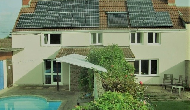 South facing cottage for nine with pool and garden