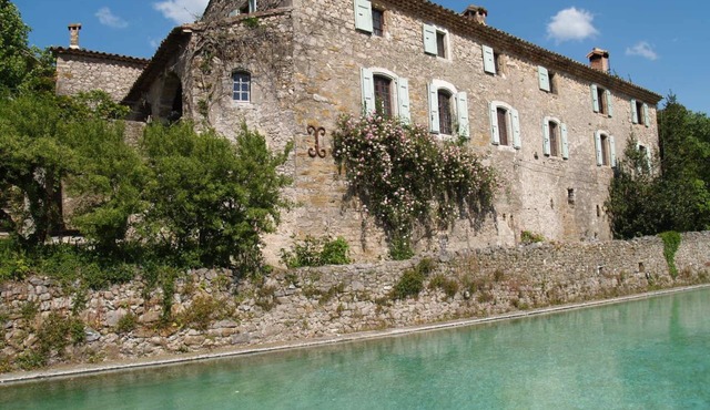 South of France (Cévennes),a 16th Century hamlet surrounded by rolling countryside, property of 32ha crossed by a river, swimming pool, tennis