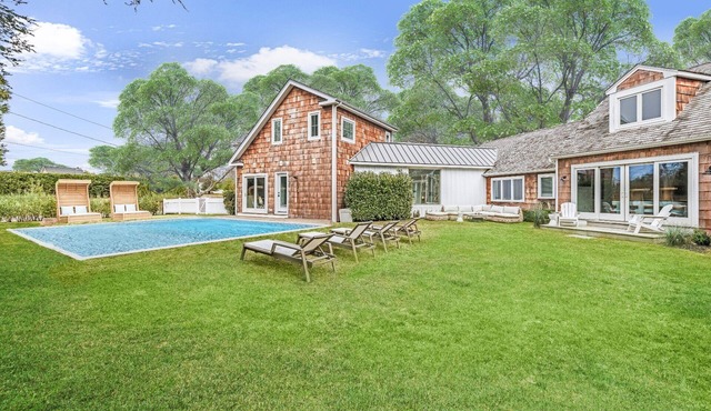 South of the highway, walking distance to town.