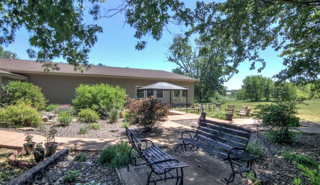 Spacious 10-bedroom, 40 beds, 3.5 bath country home in Osseo, WI with WiFi, AC