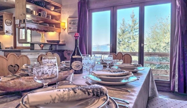 Spacious 12-14 person ski chalet with stunning views and huge terrace