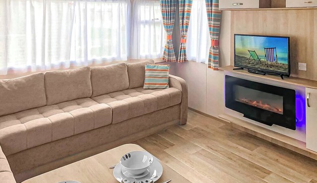 Spacious 12ft-wide caravan with one double and one twin.