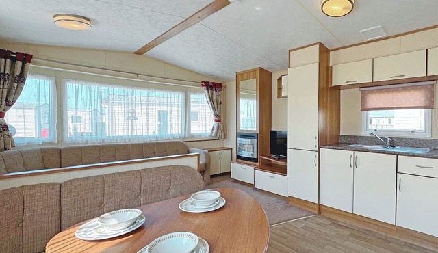 Spacious 12ft wide caravan with one double and one twin.