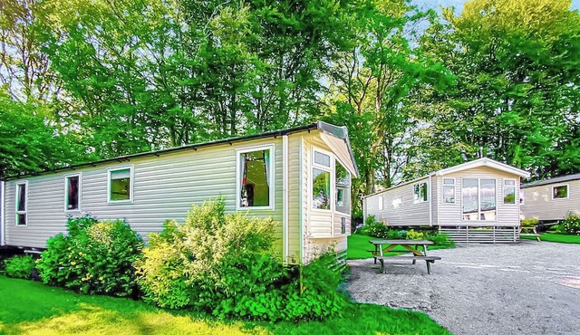 Spacious 12ft-wide family caravan with one double and one twin.