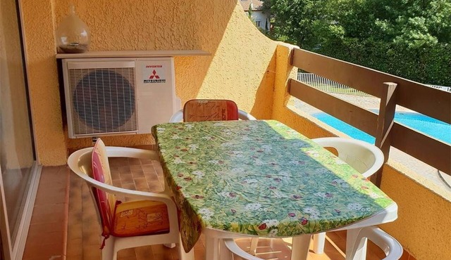 Spacious 2-BR Apartment, Pool View, 300m from Beach, A/C, Parking, Balcony, Elevator Access