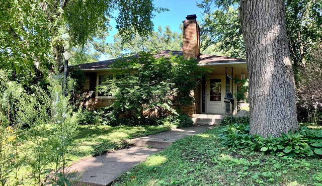 spacious 2 BR unit in duplex with one-car attached garage and in-unit laundry