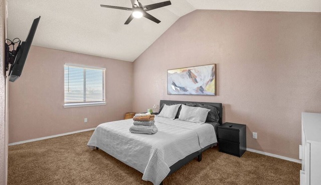 Spacious 2-story contemporary home perfect for families or professionals. Features a dedicated office, fully equipped kitchen, and a rare king bed in the primary suite. Comfortably accommodates your group with multiple stylish bedrooms.