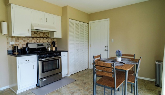 "Spacious 2BR Retreat with Office, Stunning Backyard & Grill in Hanover Park"