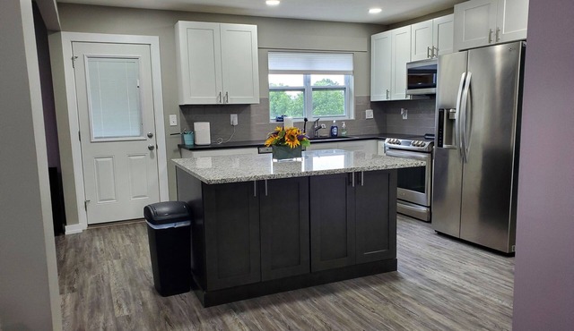 Spacious 3-bedroom home, off I-64 & 35, sleeps 11