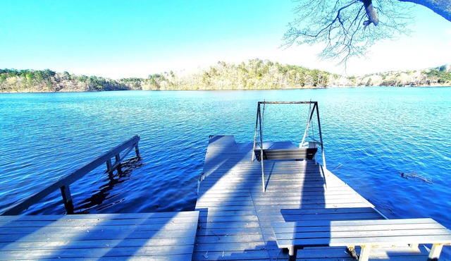 Spacious 4-bed, 3-bath home located on Lake Catherine with pool and boat dock