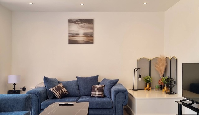 Spacious 4-Bed Home with Parking