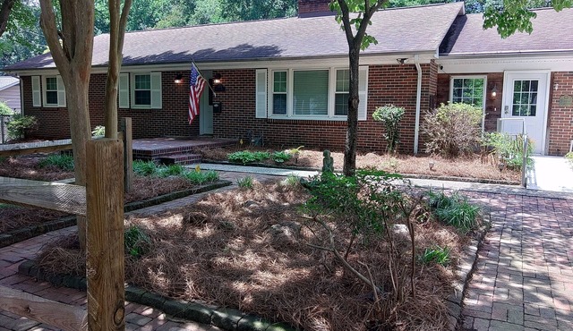 Spacious 4-bedroom house in charming Winston-Salem with WiFi and fenced in yard.