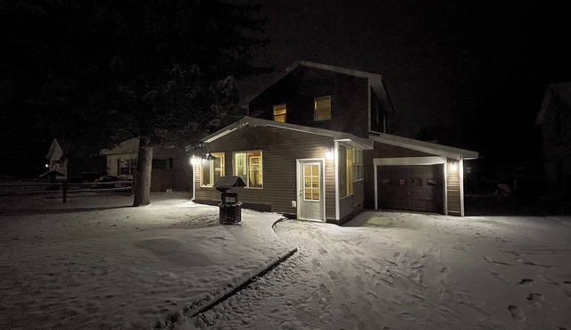 Spacious 4-bedroom home with atv/snowmobile trail across the street. Come UP!