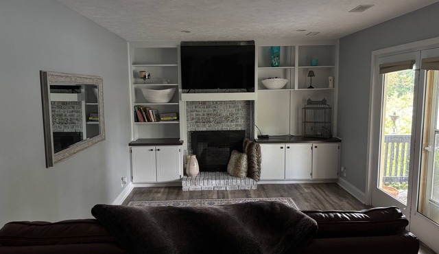 Spacious 4-bedroom house in amazing Omaha with WiFi, backyard oasis.
