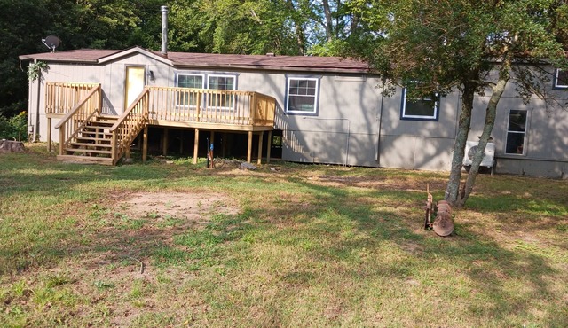 Spacious 4-bedroom mobile home 40 acres on Baron Fork 10 miles from Tahlequah