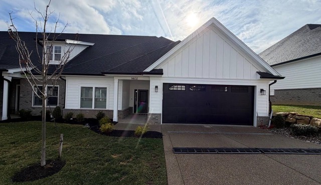 Spacious 4-bedroom townhome with 2 car garage in perfect Louisville location