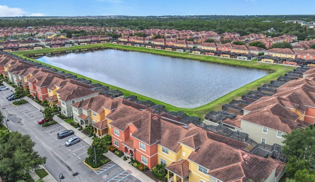 Spacious 4-bedroom townhome with fitness room and AC in lovely Kissimmee