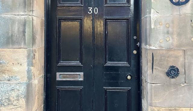 Spacious 4 bedroom townhouse with traditional features and private courtyard