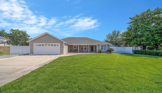 Spacious 4-bedroom house in Panama City Beach with a Pool, WiFi, & Game Room!