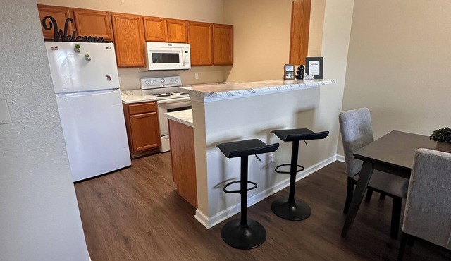 Spacious 4-bedroom apartment with WiFi, fitness room in charming Warrensburg