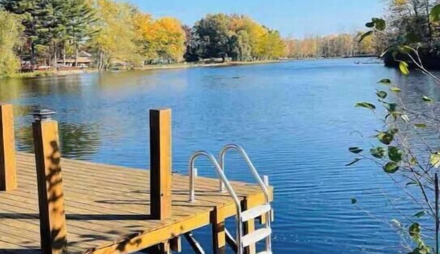 Spacious 4-bedroom waterfront house in Sylvan Beach with private yard and dock.