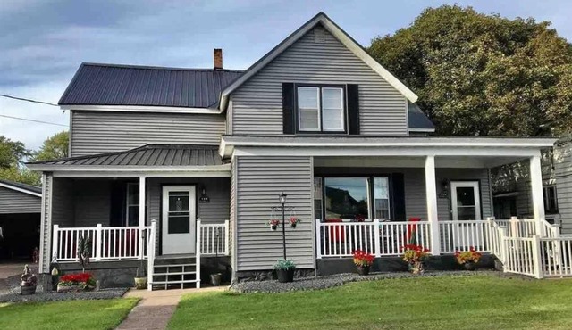 Spacious 4 BR 2BA Home with Bar and Fenced Yard