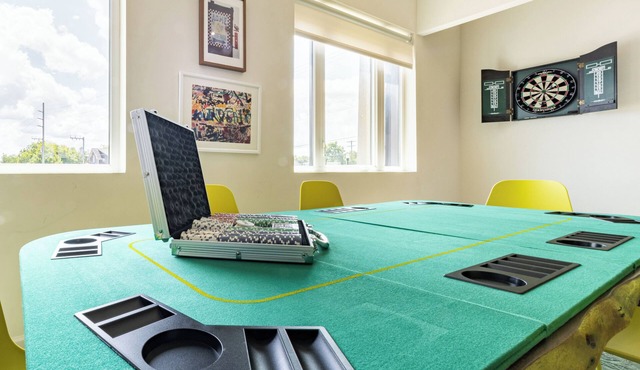 Spacious 4BR | 2 Living Rooms + Putting Green & Balcony | Downtown | Vinyl House