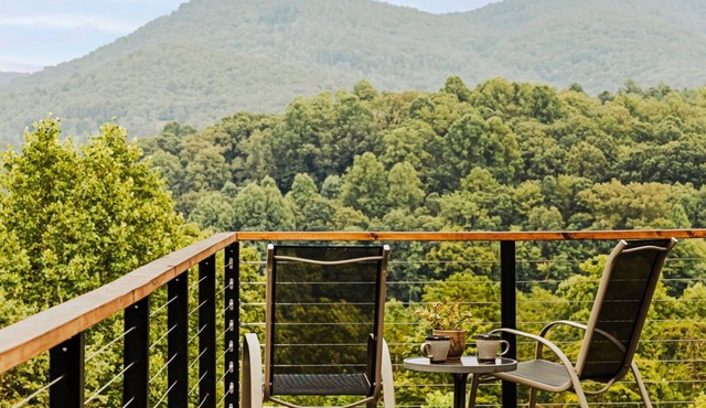 Spacious 4BR mountain retreat with sweeping views, large deck, and chef’s kitchen. Unwind by the fireplace or soak in the hot tub. Perfect for spring getaways, family gatherings, and relaxed mountain stays.