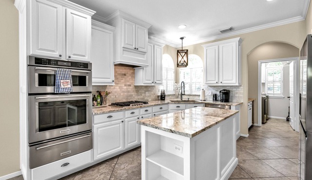 Spacious 5-Bed Home with Private Pool, Hot Tub, Game Room & Outdoor Oasis in a Prime Location!