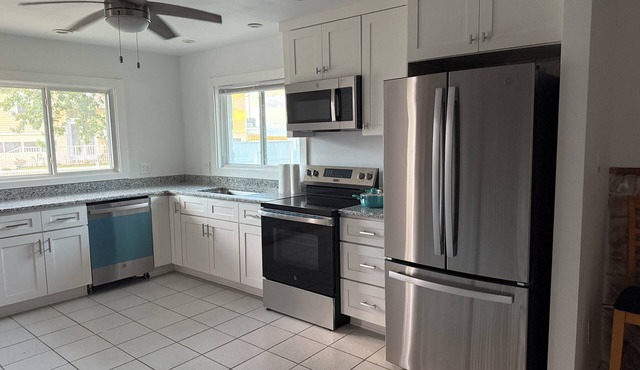 Spacious 5-bedroom beautiful water view home with private boat dock steps away.