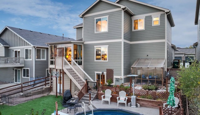 Spacious 5 Bedroom Home With Mountain Views, Heated Pool, & Sunroom!