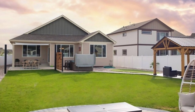 Spacious 5-bedroom house in charming Windsor with WiFi, hot tub and game room.