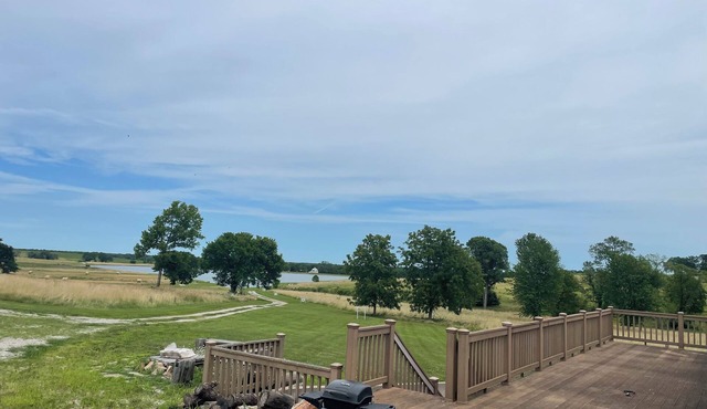 Spacious 5-bedroom house overlooking a serene 20 acre lake