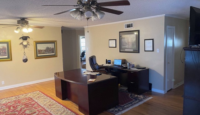 Spacious 5 bedrooms with an office, 2 kitchens, and 2 large porches in Flint.