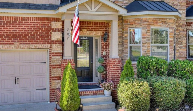 Spacious 6-bedroom house in enchanting Evans with AC and fitness room.