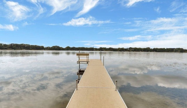 Spacious 6-bedroom lake home with an indoor pool, hot tub, and sauna.