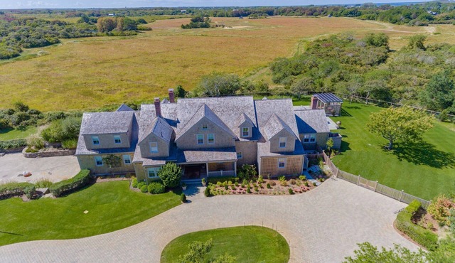 Spacious 6-bedroom luxury villa on edge of Nantucket Nature reserve; full gym.