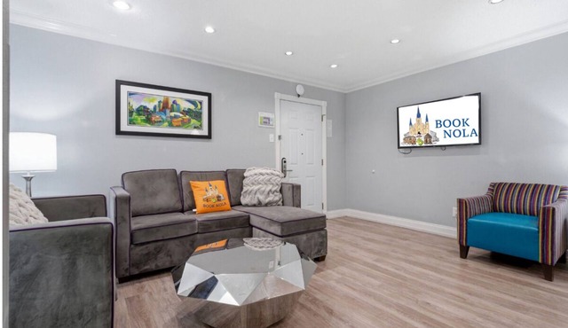 Spacious 8BR Frenchmen Street stay with pool, hot tub, parking, and easy access to the French Quarter and live music.