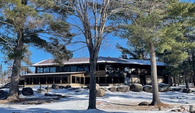 Spacious 9-bedroom motel & lodge on the beautiful Wolf River in Northern WI.