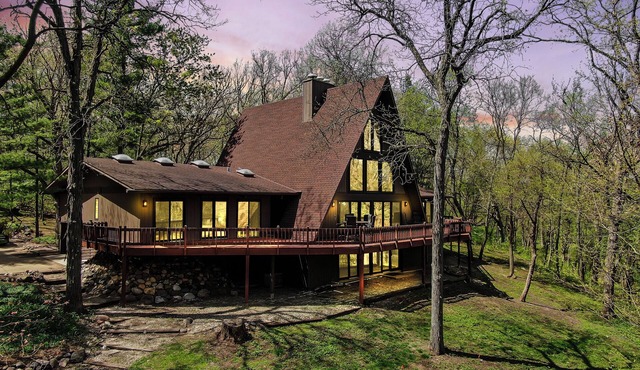 Spacious A-Frame sleeps 25 on 5 wooded acres with a private fishing pond